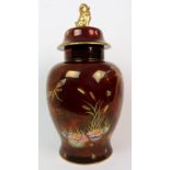 A CARLTON WARE ROUGUE ROYALE JAR AND COVER the body decorated with bullrushes, waterlilies and