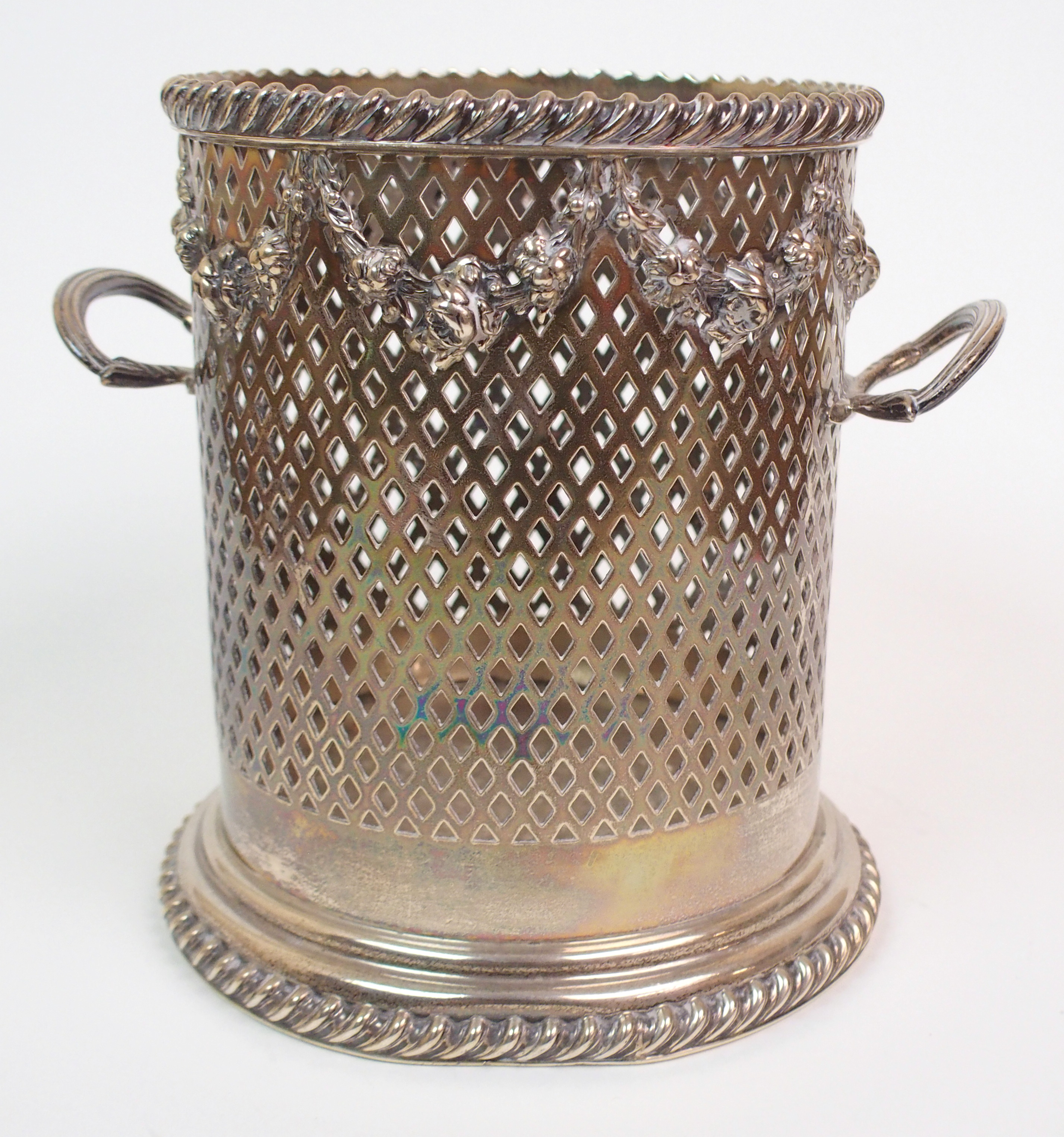 A GEORGE V SILVER BOTTLE STAND by Goldsmiths & Silversmiths Co., London 1911 of cylindrical form - Image 5 of 9