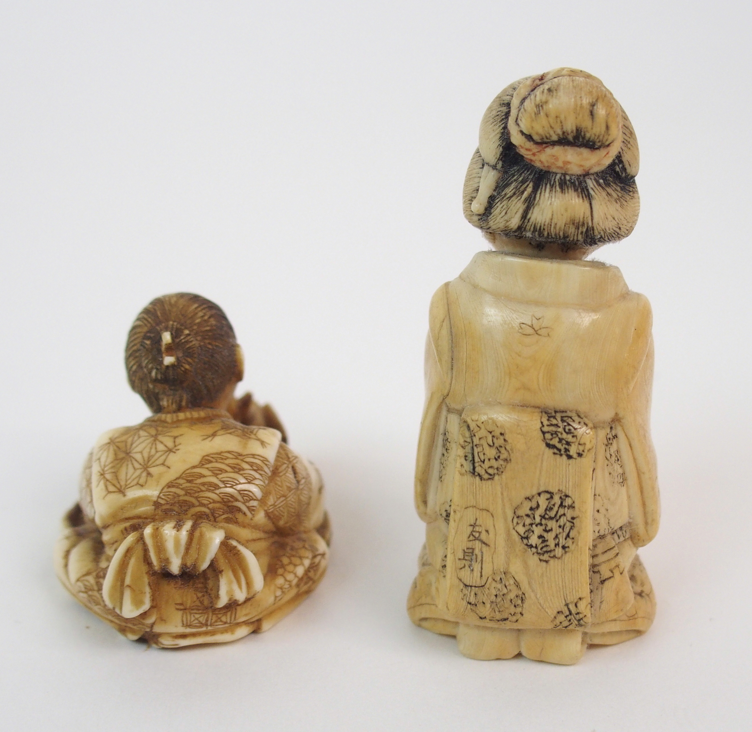 THREE JAPANESE IVORY NETSUKE one with a child seated with a kettle, 3cm high, figure with monkey, - Image 4 of 8