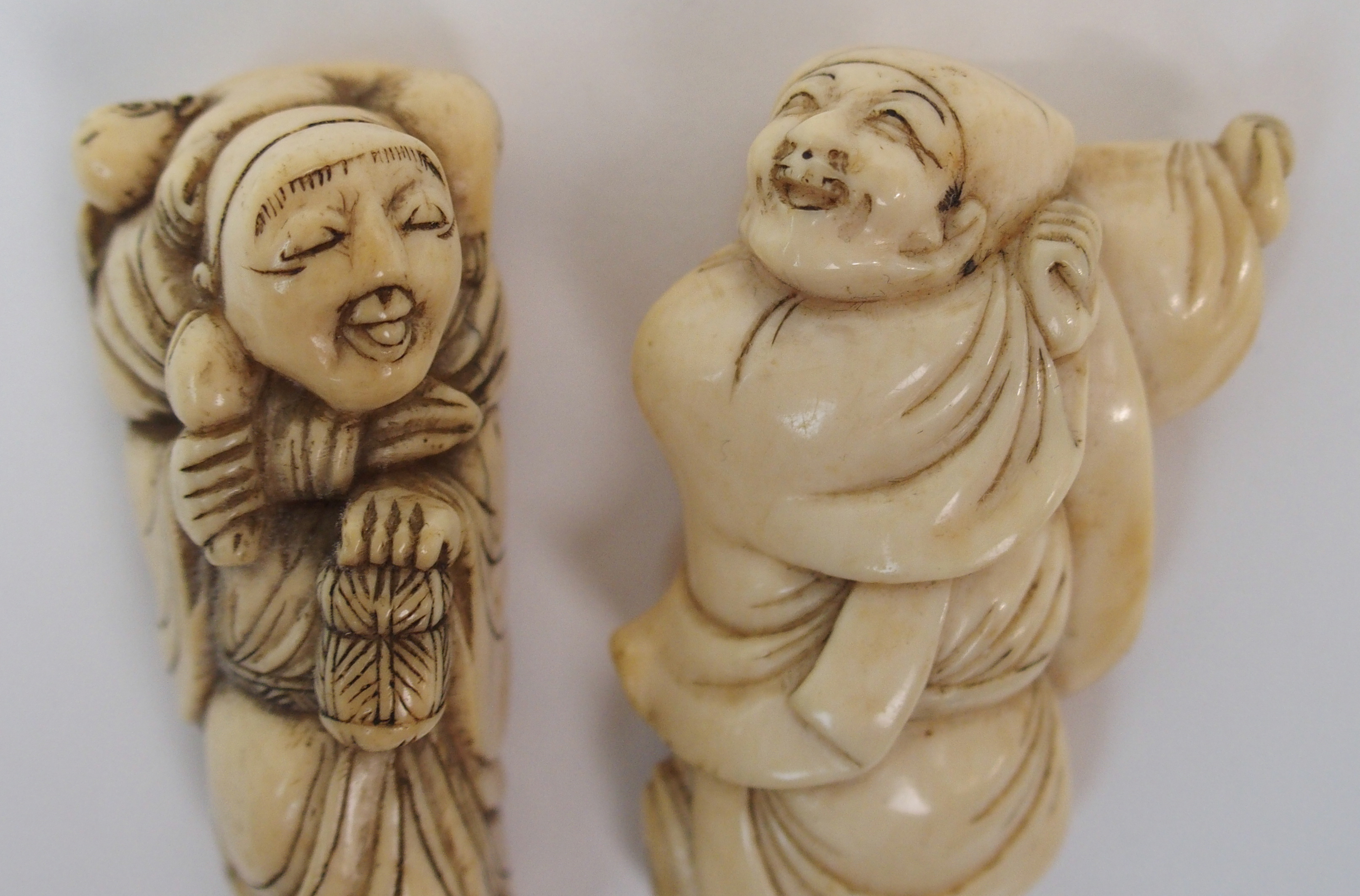 THREE JAPANESE IVORY NETSUKE one with a child seated with a kettle, 3cm high, figure with monkey, - Image 7 of 8