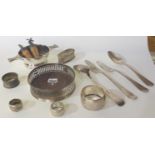 A lot comprising two continental silver forks and spoons, silver napkin ring, quaich, wine