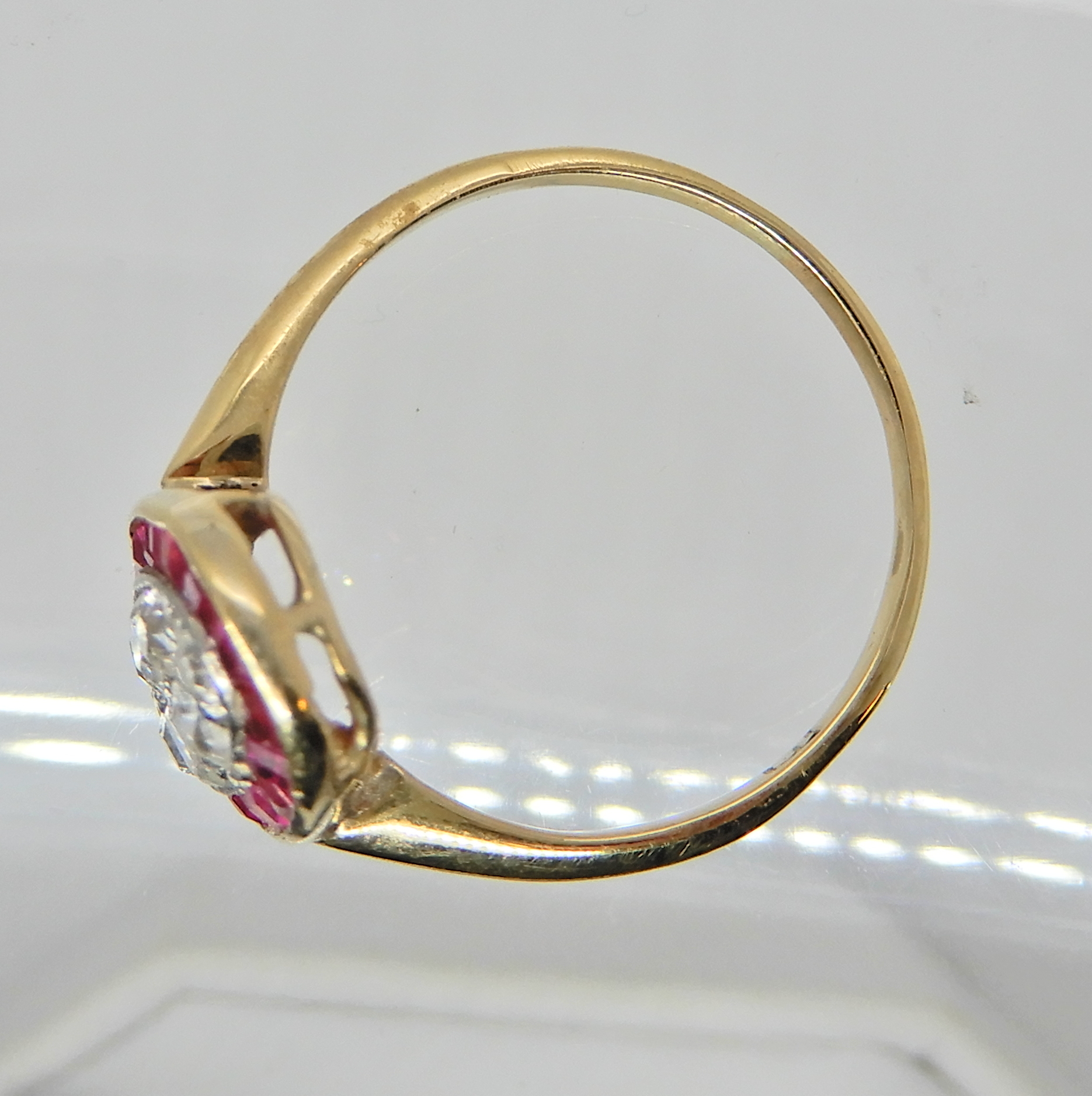 An 18ct gold ruby and diamond plaque ring, finger size N1/2, weight 2.6gms, with an insurance - Image 3 of 4