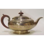 A silver teapot, Birmingham 1924, 303gms