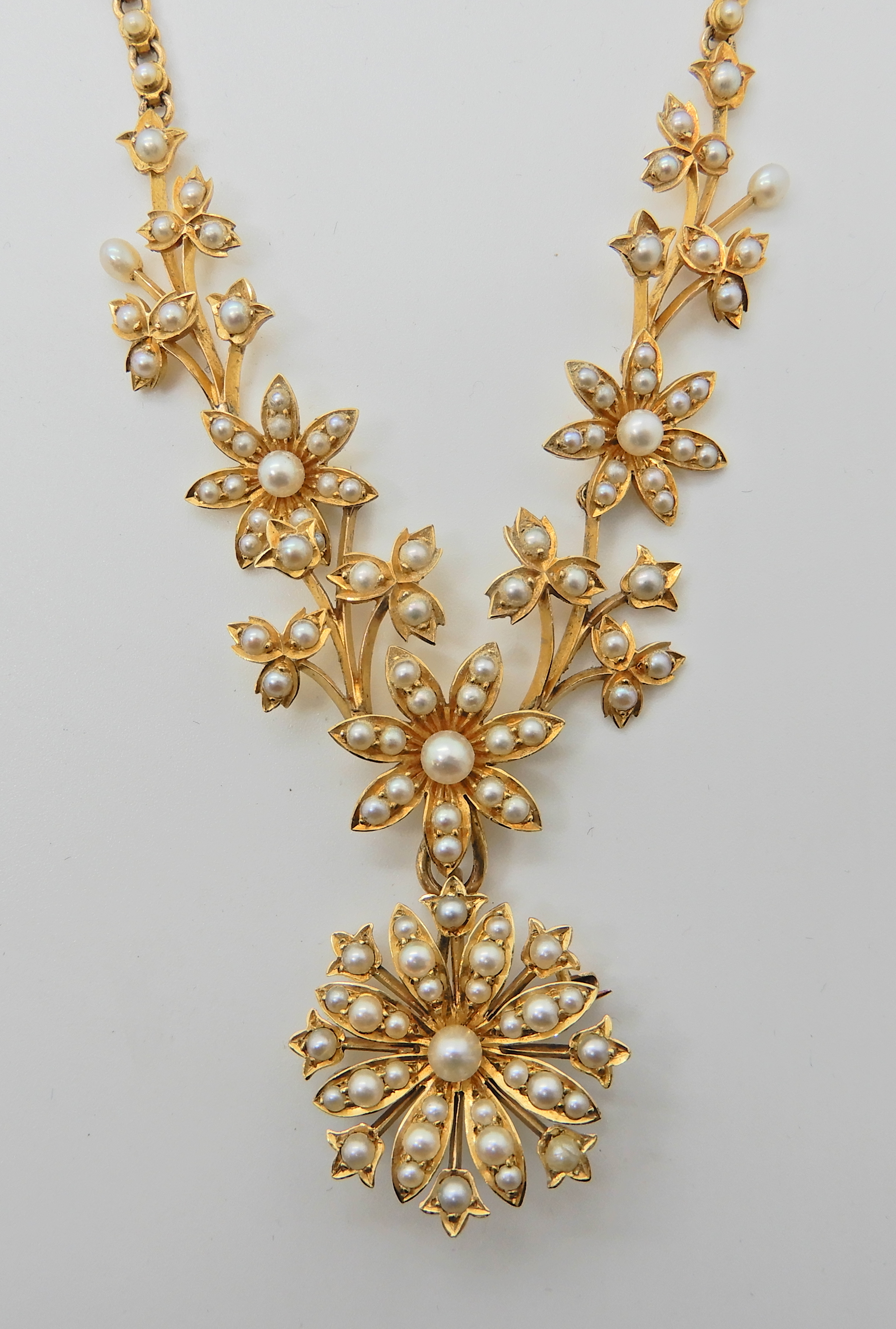 A 15ct gold floral pearl set necklace with detachable brooch, the chain is also set along its length - Image 2 of 4