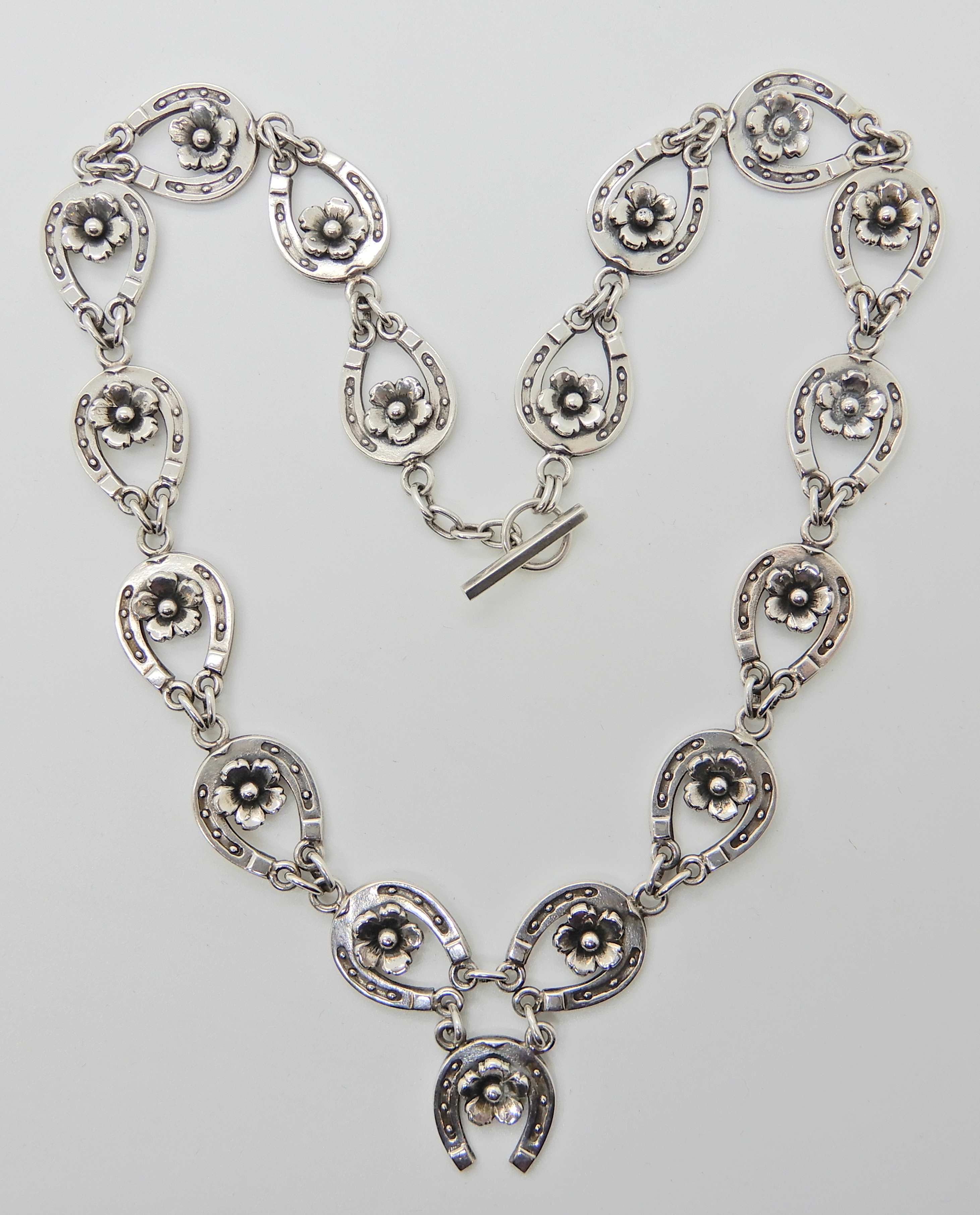 A silver lucky horseshoe necklace by Danish silversmith FROM, length approx 44cm, weight 42gms