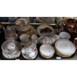 A Crown Staffordshire teaset decorated with flowers, an Aynsley teaset, another teaset and figures