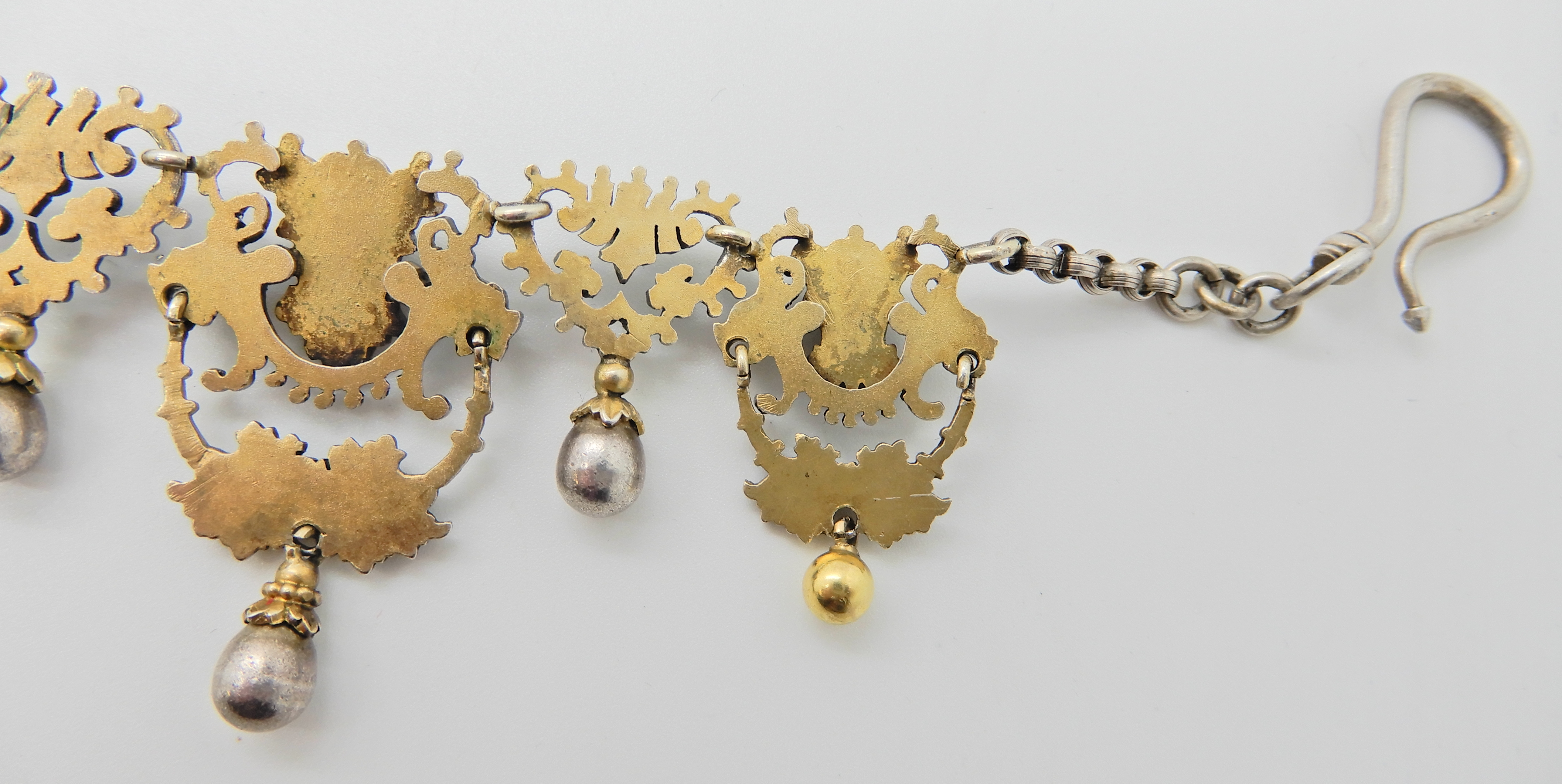 A gilded white metal Gothic design necklace with lion heads and 'Pan' grotesque masks and roses, - Image 7 of 8