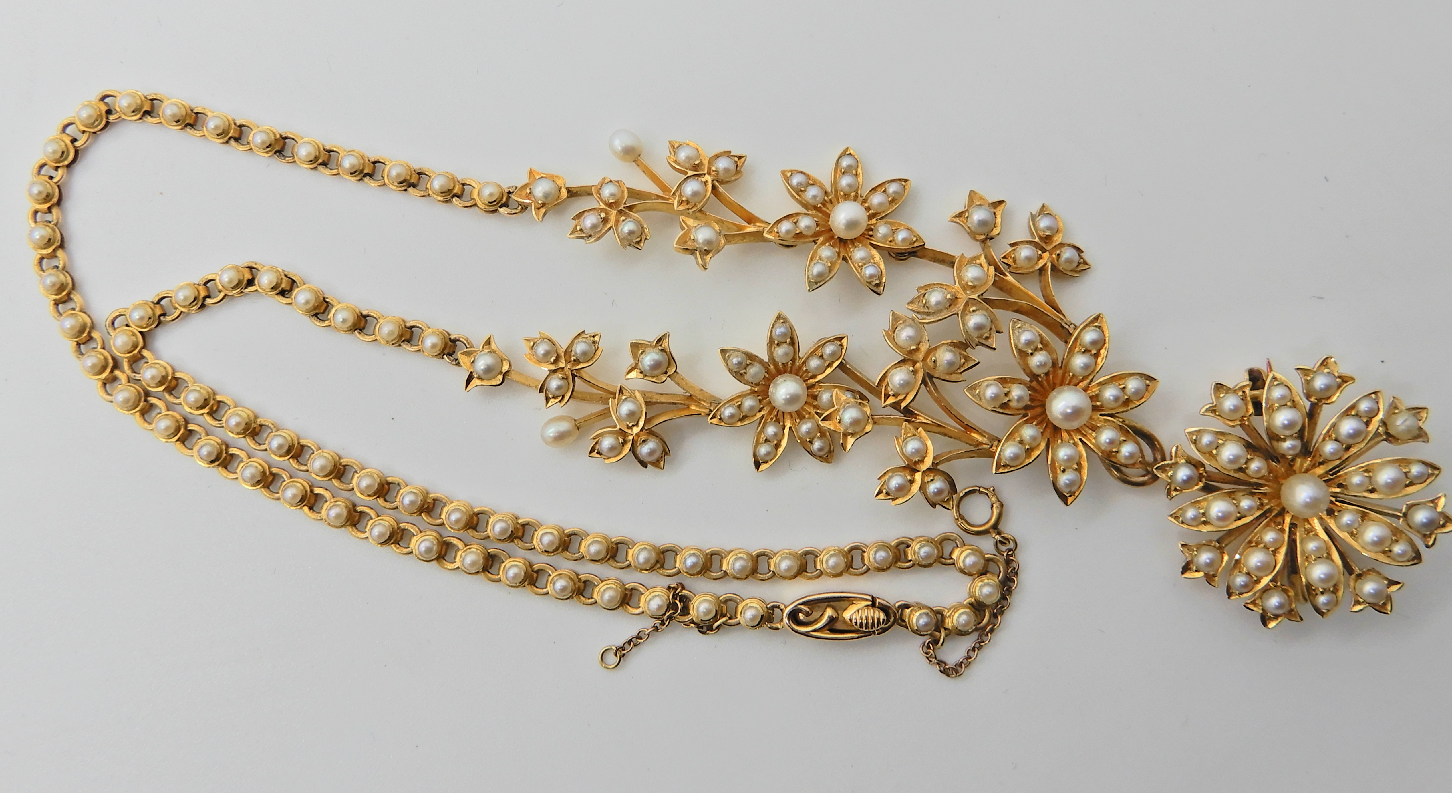A 15ct gold floral pearl set necklace with detachable brooch, the chain is also set along its length - Image 4 of 4