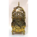A brass lantern clock, the movement marked R&C 167984, with doors to three sides, 33cm high, with