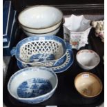 An 18th century chestnut basket and stand, two porcelain bowls, tea bowls and other ceramics (some