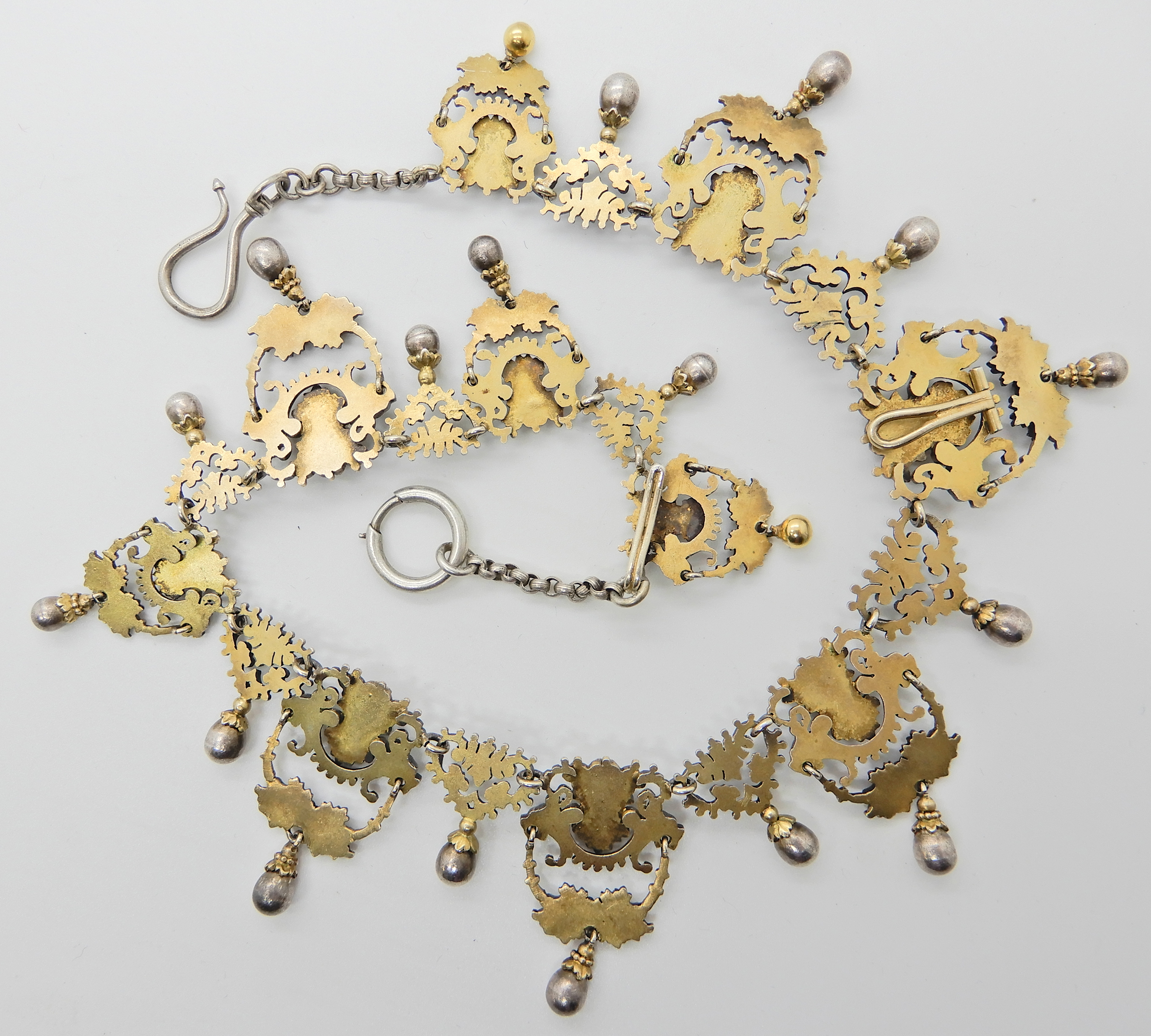 A gilded white metal Gothic design necklace with lion heads and 'Pan' grotesque masks and roses, - Image 4 of 8