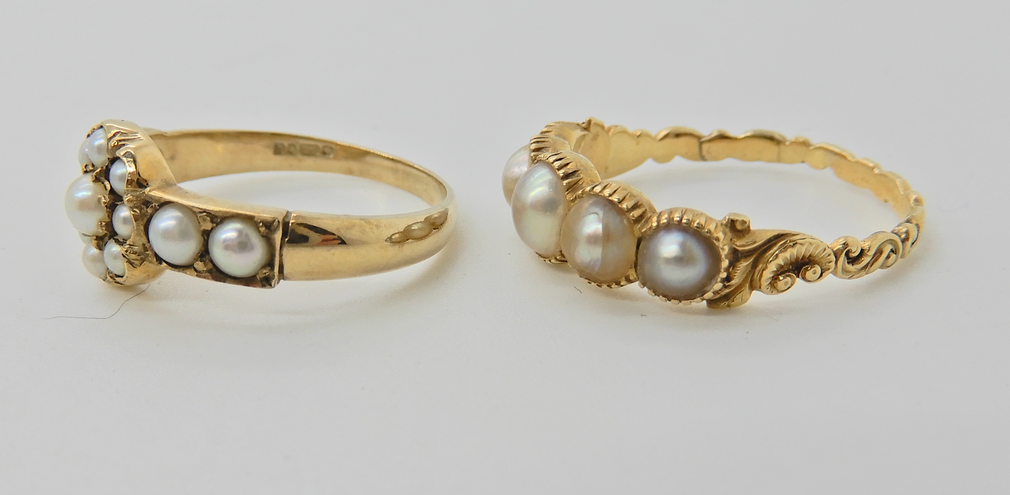 A bright yellow metal five pearl set ring with scrolled shoulders. Finger size O1/2, weight 3. - Image 3 of 4