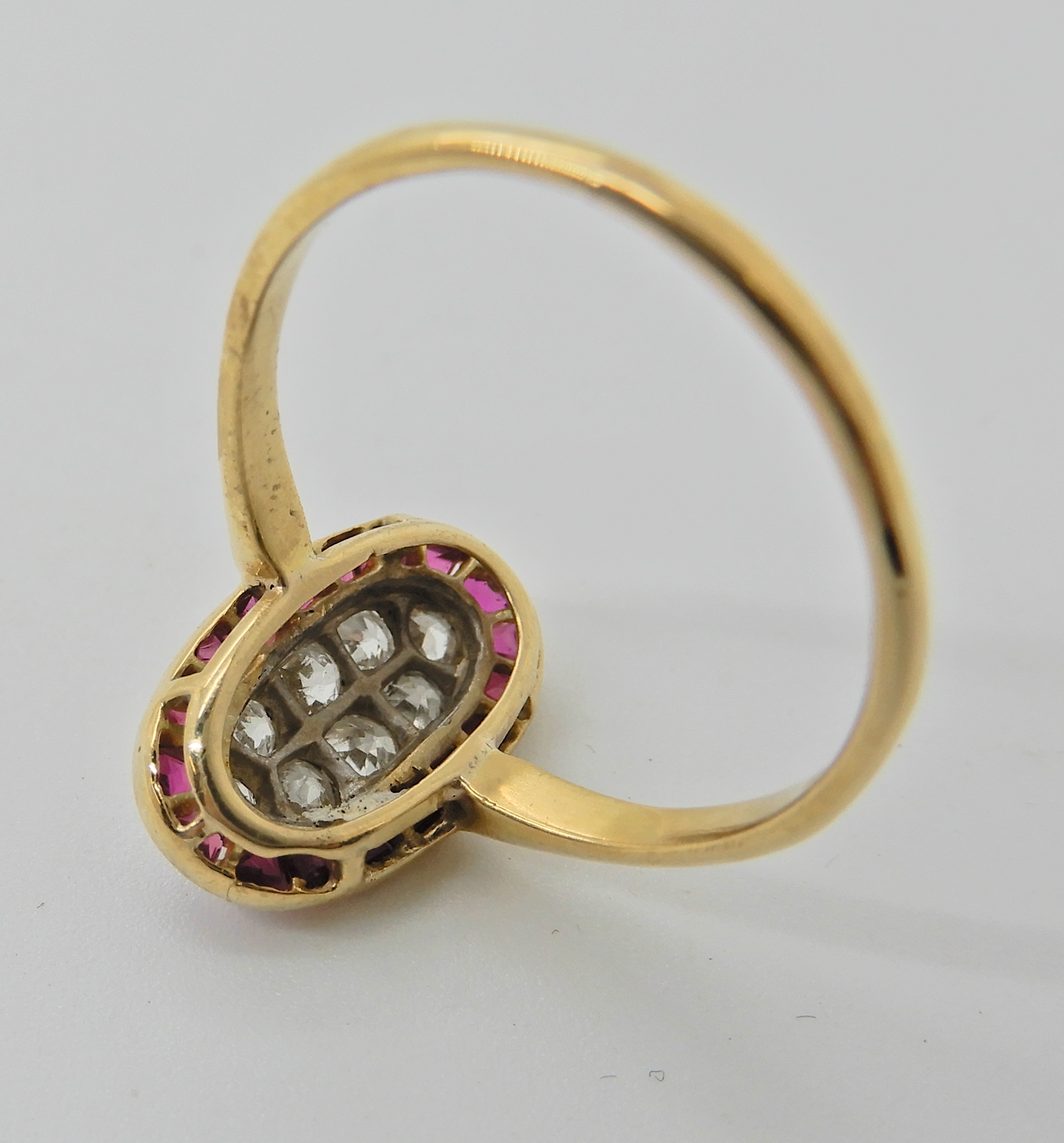 An 18ct gold ruby and diamond plaque ring, finger size N1/2, weight 2.6gms, with an insurance - Image 4 of 4