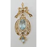 A 15ct gold aquamarine and pearl Edwardian pendant brooch, dimensions of the aquamarines, largest