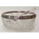 A sterling silver and cut glass salad bowl, marked 925 with a cut glass handled silver server,