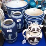 Three Wedgwood blue jasperware jardinieres of graduating sizes, a pair of vases and a cream and