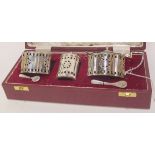 A cased three-piece silver condiment set, Sheffield marks, 231gms