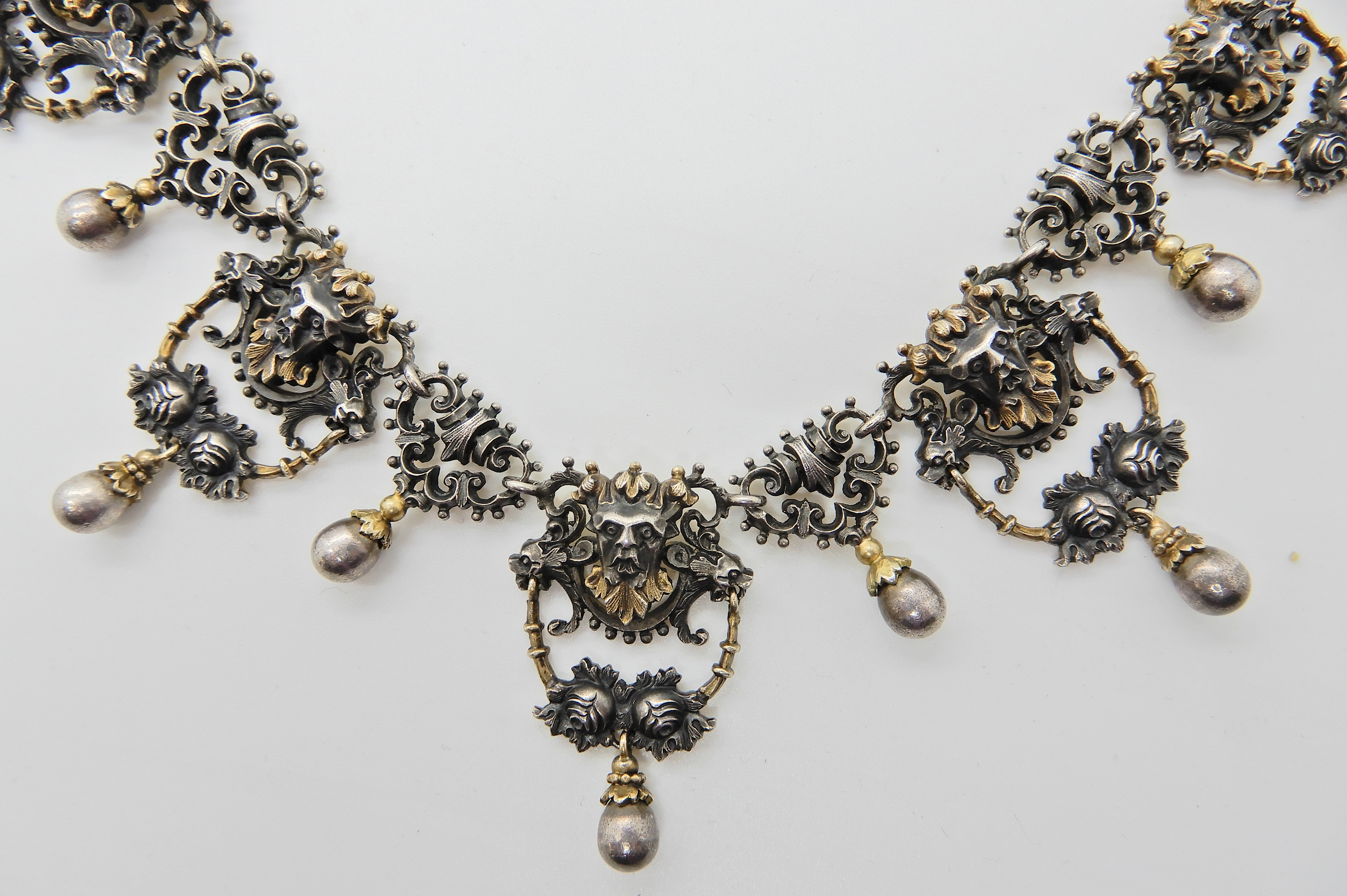 A gilded white metal Gothic design necklace with lion heads and 'Pan' grotesque masks and roses, - Image 3 of 8