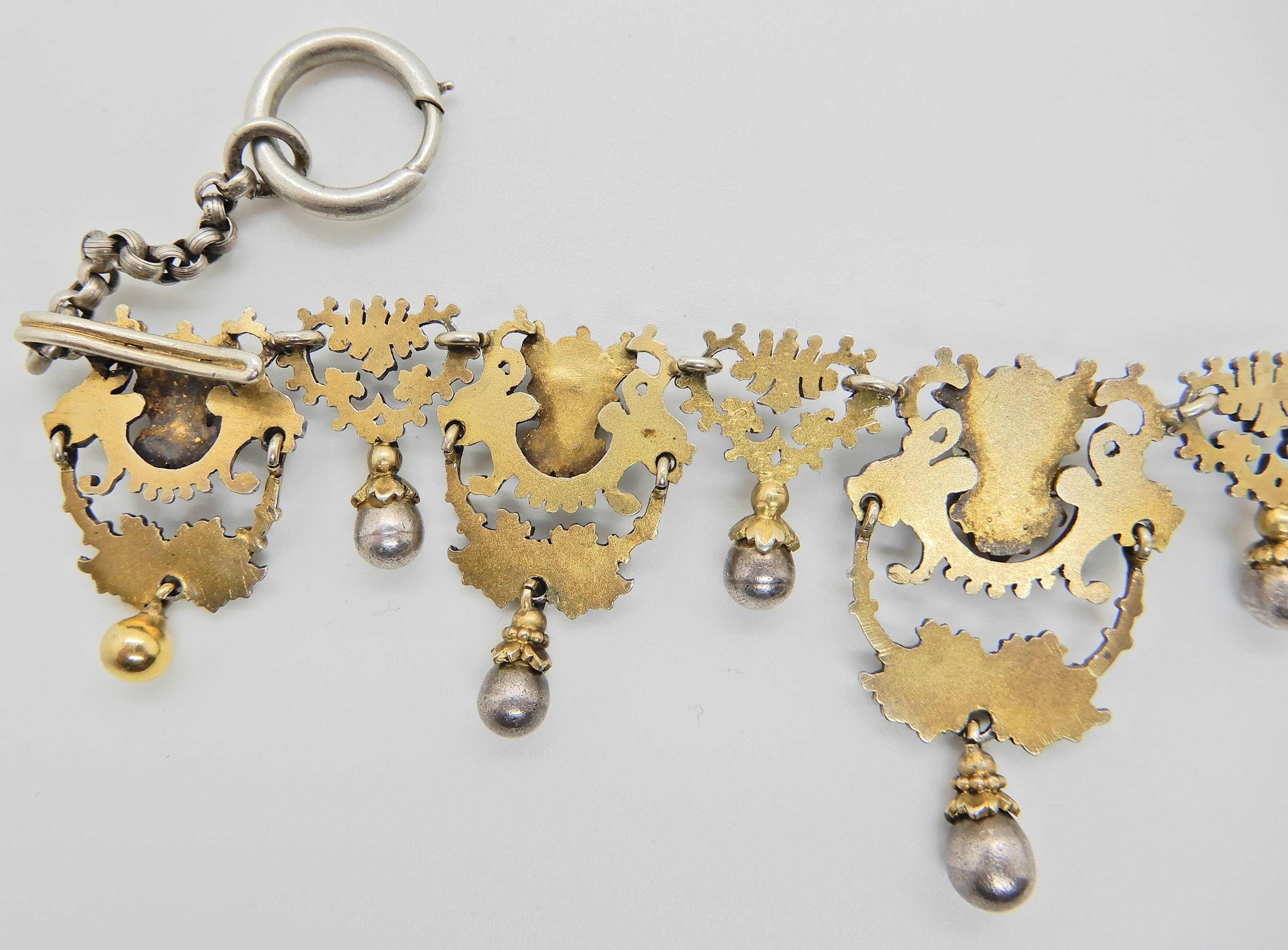 A gilded white metal Gothic design necklace with lion heads and 'Pan' grotesque masks and roses, - Image 6 of 8