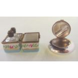 A lot comprising a silver pill box and a pair of miniature scent bottles in porcelain case