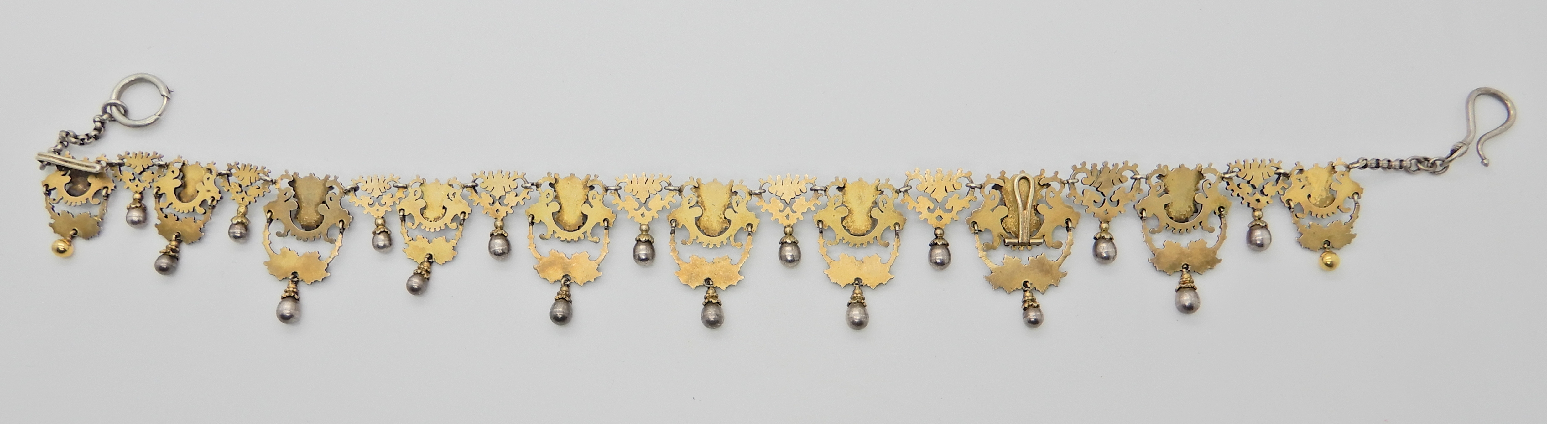 A gilded white metal Gothic design necklace with lion heads and 'Pan' grotesque masks and roses, - Image 5 of 8