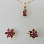 A 9ct gold ruby and diamond pendant and chain length 46cm, together with a pair of ruby flower