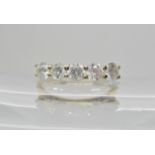 A 9ct gold five stone diamond ring of estimated approx diamond content 0.89cts, finger size O,