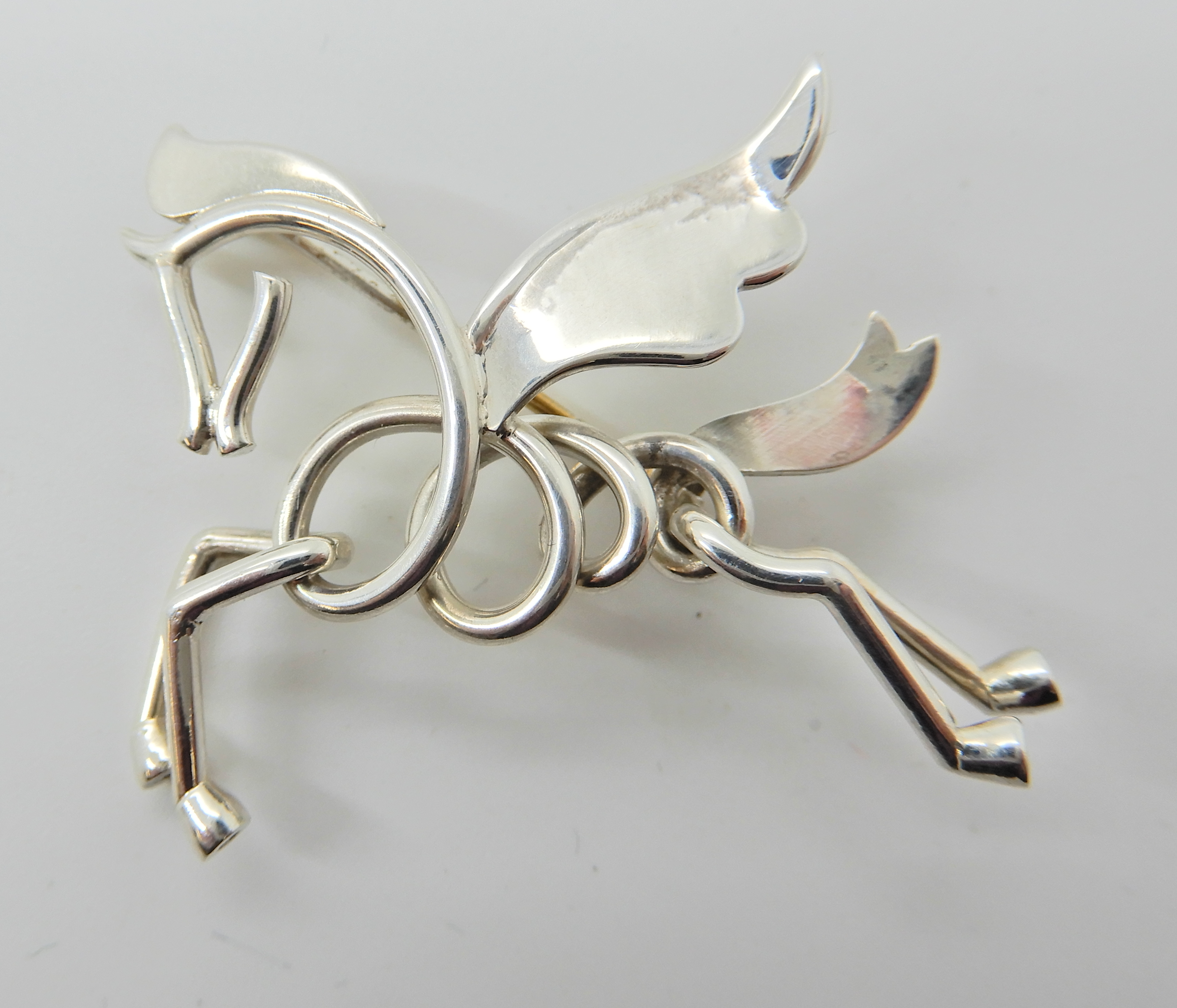 An Anton Michelsen silver Pegasus brooch, dimensions 3.8cm x 3cm, weight 5.3gms
