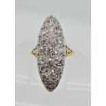 A bright yellow metal old cut diamond ring of marquis shape set with estimated approx 2.30cts, set