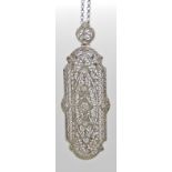 A 14ct white gold Art Deco style pendant brooch with a highly pierced design set with diamonds, to