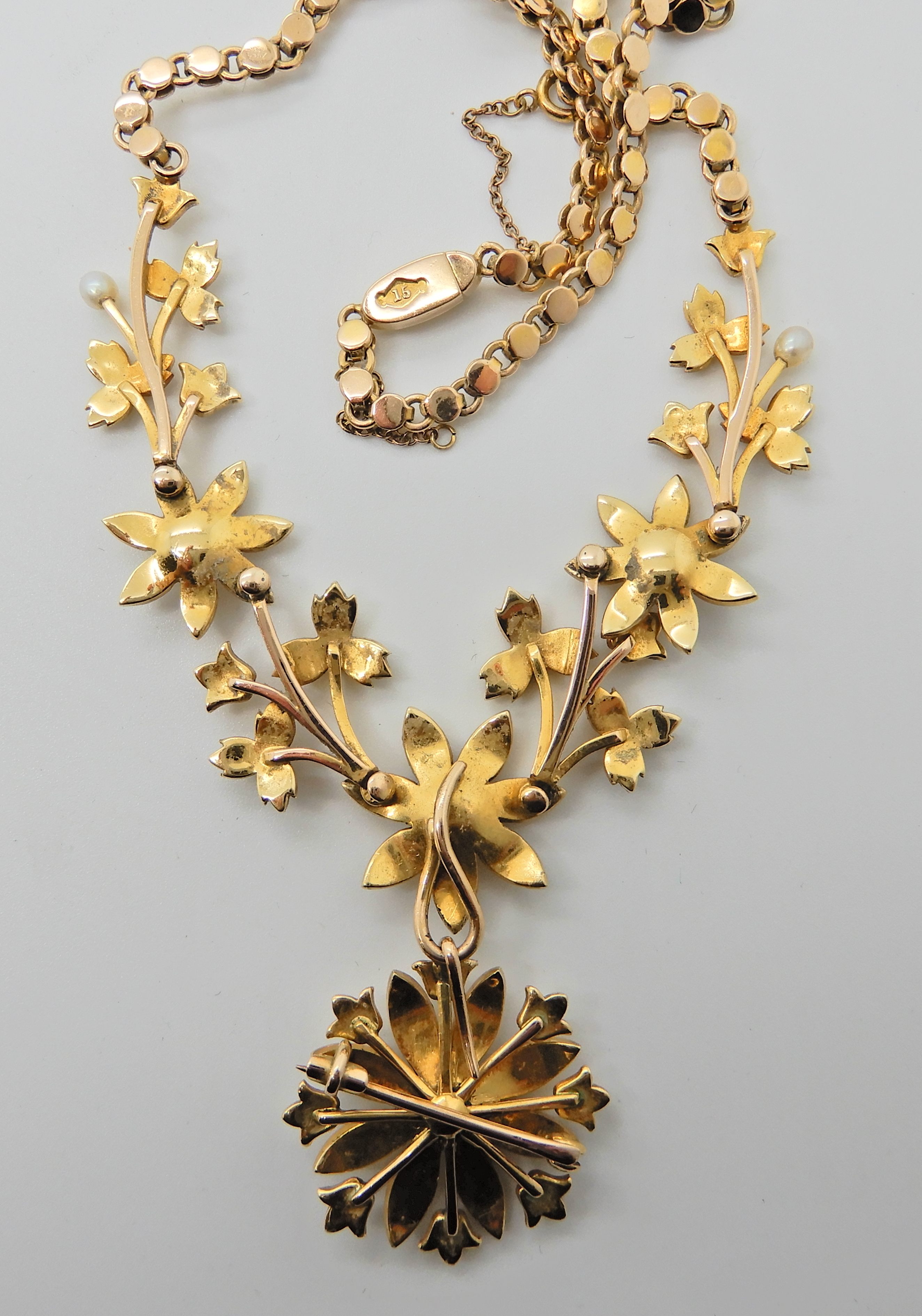 A 15ct gold floral pearl set necklace with detachable brooch, the chain is also set along its length - Image 3 of 4