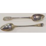 A lot comprising two silver basting spoons, Exeter 1811 and London 1817, 255gms