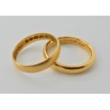 A 22ct gold wedding ring finger size M, together with another finger size O, weight approx 8.3gms