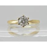 A yellow and white metal diamond solitaire ring of estimated approx 0.20cts, finger size N, weight