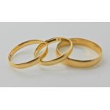 Three 18ct gold wedding rings finger sizes O1/2, Q and V, weight approx 6gms Condition Report: