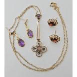 A 9ct gold amethyst and pearl set pendant necklace, a pair of amethyst 9ct gold earrings and a