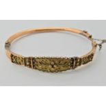 A yellow metal bangle of Etruscan design (af) weight 6.4gms Condition Report: