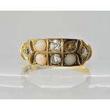 An 18ct gold coral and diamond ring finger size P, weight approx 3.8gms Condition Report: