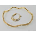 An 18ct gold bangle (af) weight approx 4.3gms and a single 9ct earring weight approx 0.8gms