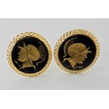 A pair of 14k gold cufflinks with intaglio carved centurion heads weight 16.8gms Condition Report: