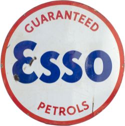 Motoring enamel advertising sign GUARANTEED ESSO PETROLS measuring 25.5in diameter. In good