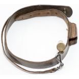 LNWR Policeman’s whistle on a leather bandolier type strap with integral whistle pocket. Brass