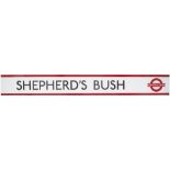 London Underground enamel frieze sign SHEPHERD'S BUSH with central line logo measuring 75.5in x 9in.