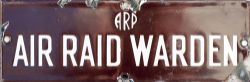 Enamel World War 2 sign ARP AIR RAID WARDEN in chocolate and white enamel with some chips.