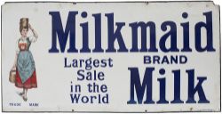 Advertising enamel sign semi pictorial MILKMAID BRAND MILK LARGEST SALE IN THE WORLD . Measures 48in