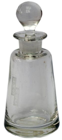 LMS NCC glass vinaigrette bottle nicely etched LMS NCC and complete with stopper. Stands 5.5in