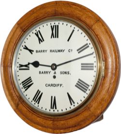 Barry Railway 12 inch Oak cased English fusee railway clock with a spun brass bezel supplied to