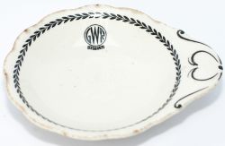 GWR black leaf china butter dish marked on the front with the GWR Hotels roundel and base marked J &