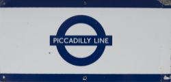 London Underground enamel frieze sign PICCADILLY LINE. In very good condition measuring 22in x 9in.