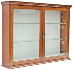 Cadburys 1920's mahogany wall hanging display cabinet with 2 front opening doors etched CADBURYS